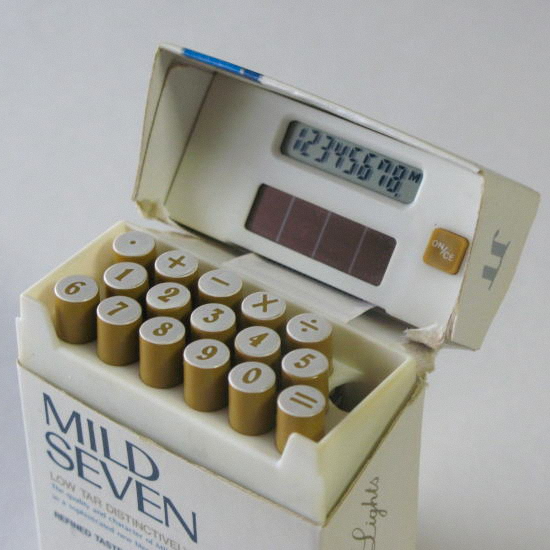 Solar calculator disguised as a Mild Seven cigarette pack, keys styled as cigarettes